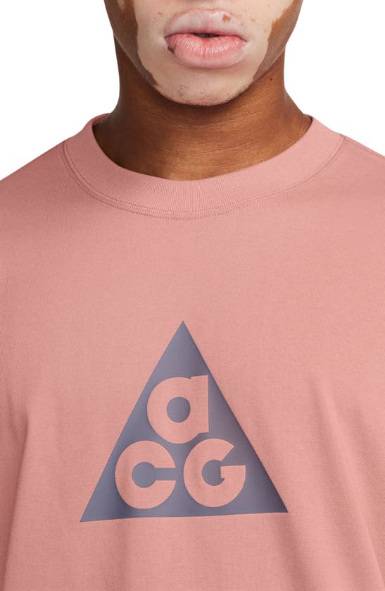 Shop Nike Dri-fit Acg Oversize Graphic T-shirt In Red Stardust