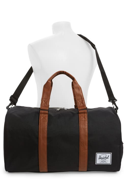 Shop Herschel Supply Co . Duffle Bag In Black/tan