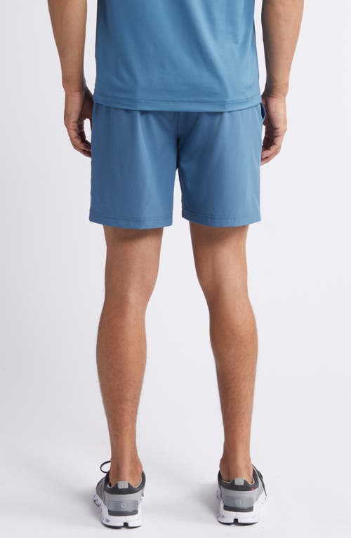 Shop Rhone Essentials 7-inch Gym Shorts In Real Teal