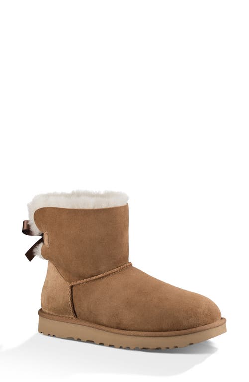 UGG(r) Mini Bailey Bow II Genuine Shearling Bootie in Chestnut Suede