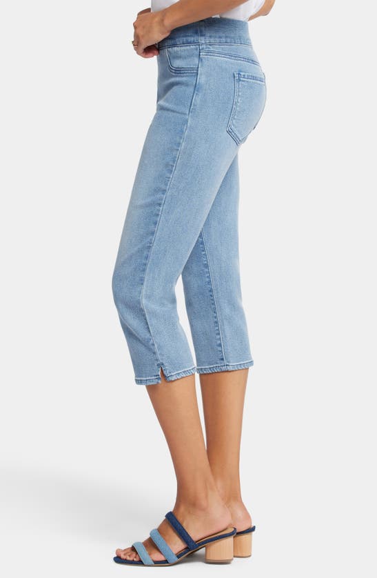 Shop Nydj Dakota Side Slit Pull-on Capri Jeans In Corfu