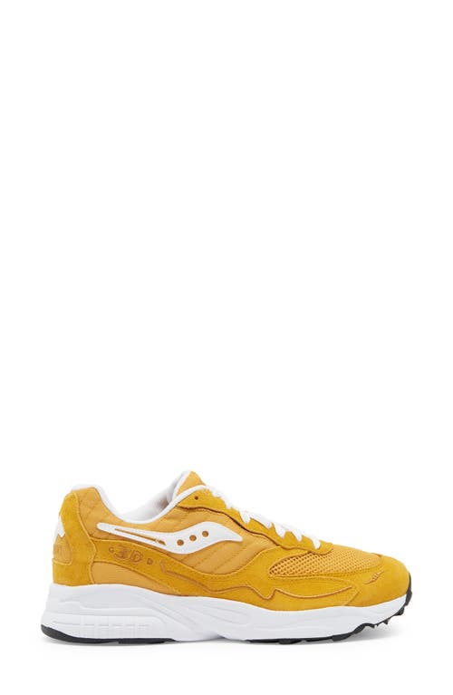 Shop Saucony 3d Grid Hurricane Sneaker In Mustard/white