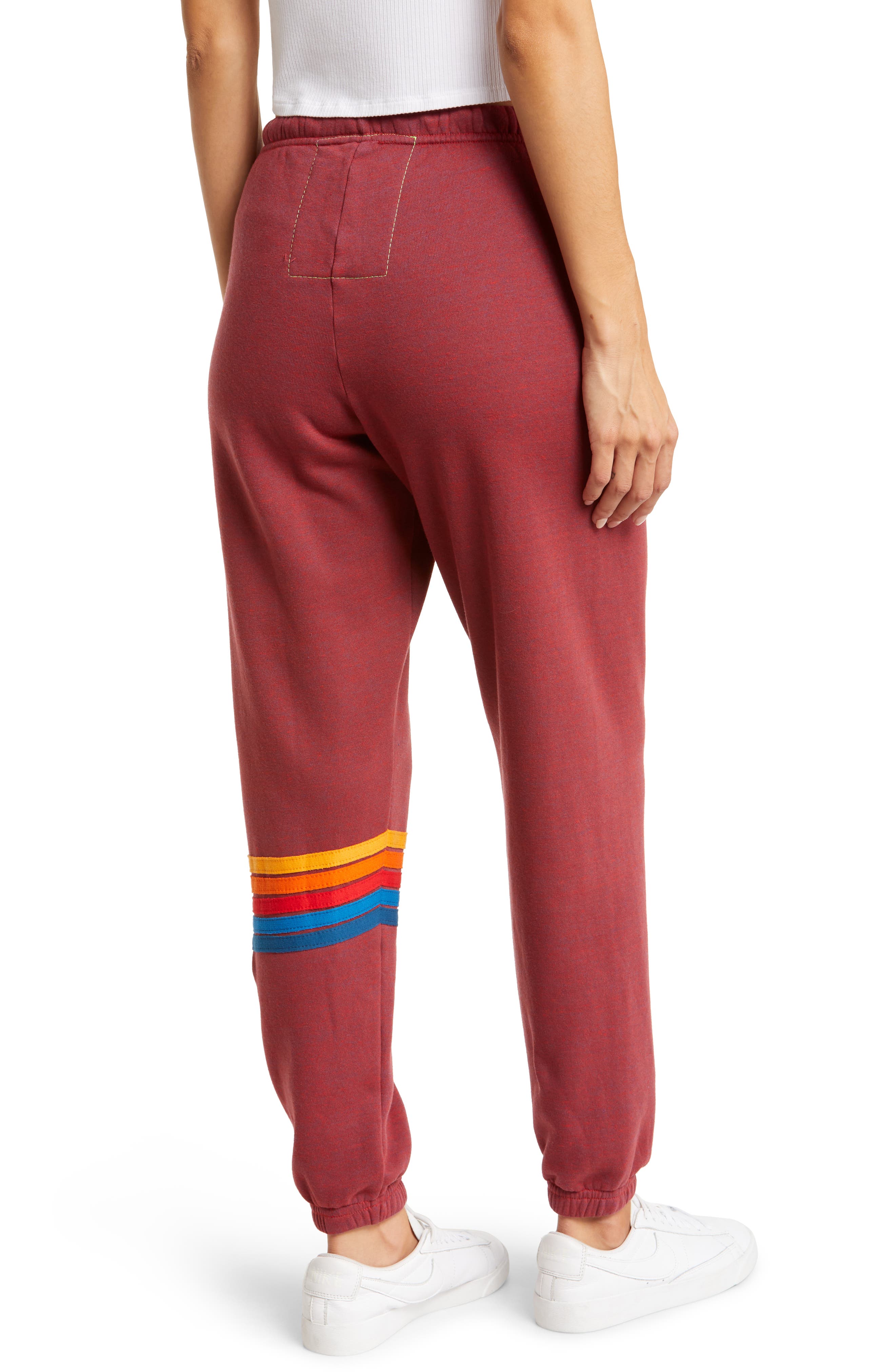 nike athletic sweatpants with rainbow stripe