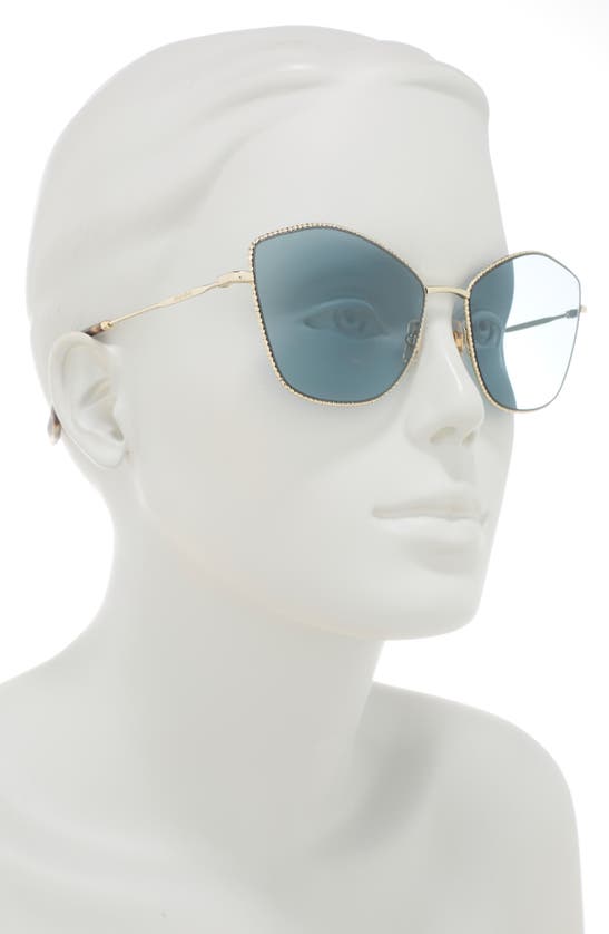 Miu Miu 60mm Cat Eye Sunglasses In Pale Gold / Light Blue