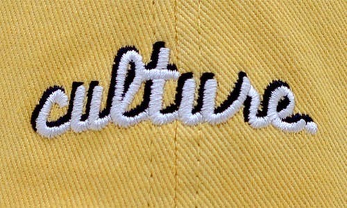 Shop A Life Well Dressed Culture Statement Baseball Cap In Yellow Denim/white