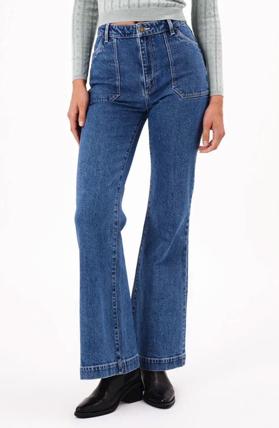 Shop Rolla's East Coast Flare Jeans In Mid Vintage Blue