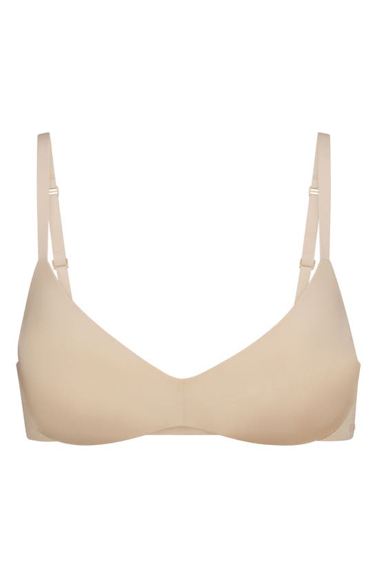 Shop Skims Wireless Form Push-up Plunge Bra In Sand