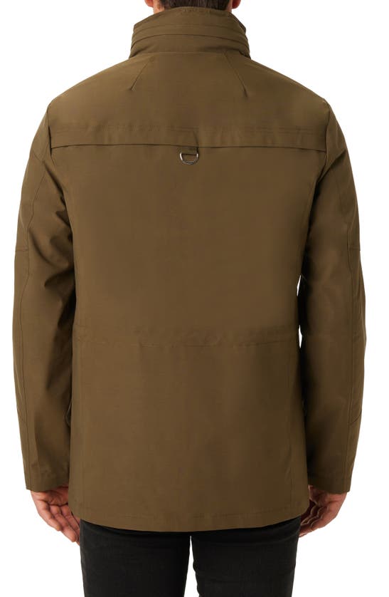 Shop Vince Camuto Water Resistant Stowaway Hood Coat In Olive
