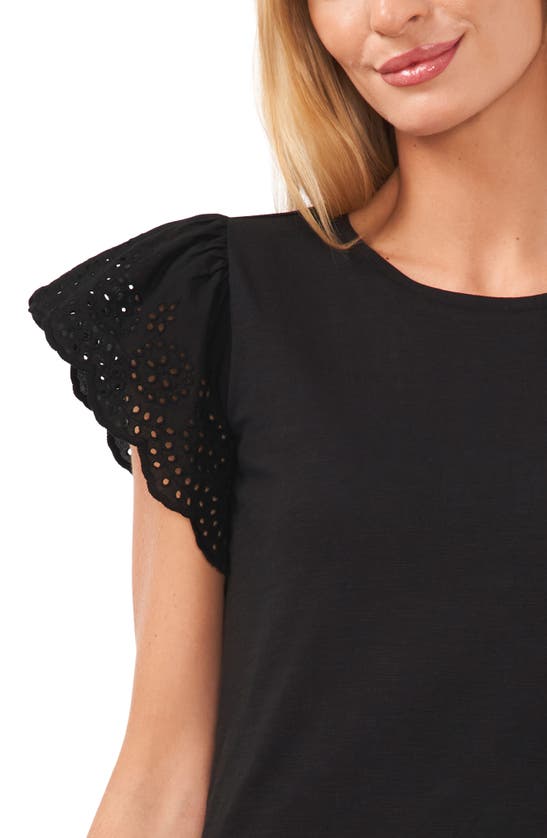 Shop Cece Eyelet Flutter Sleeve T-shirt In Rich Black