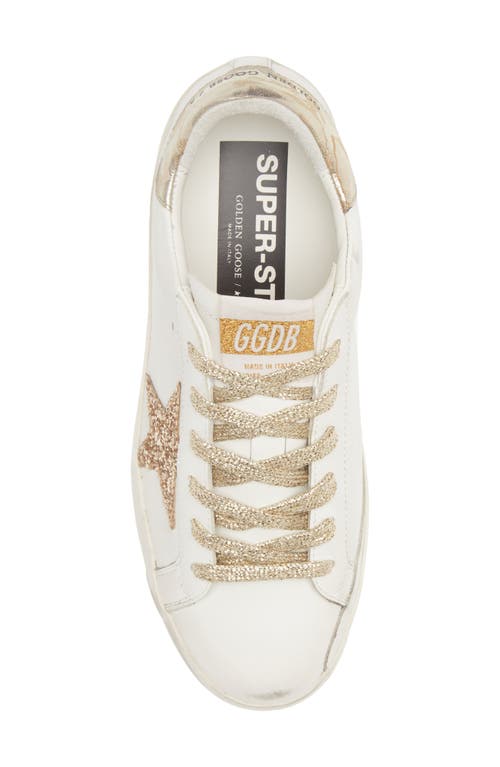 Shop Golden Goose Super-star Low Top Sneaker In White/gold