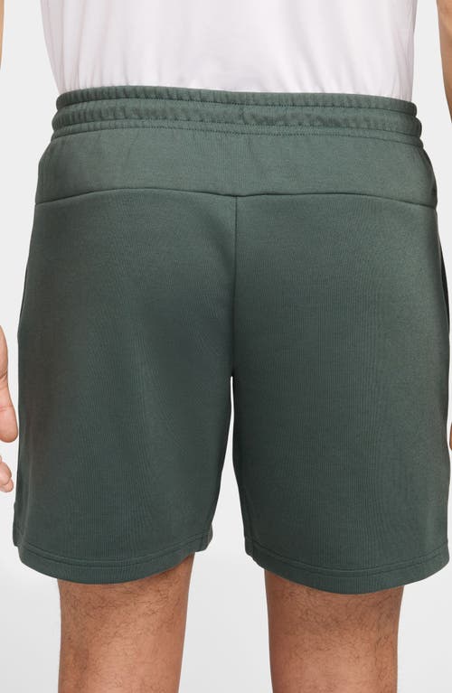 Shop Nike Primary Dri-fit Unlined Shorts In Vintage Green/vintage Green