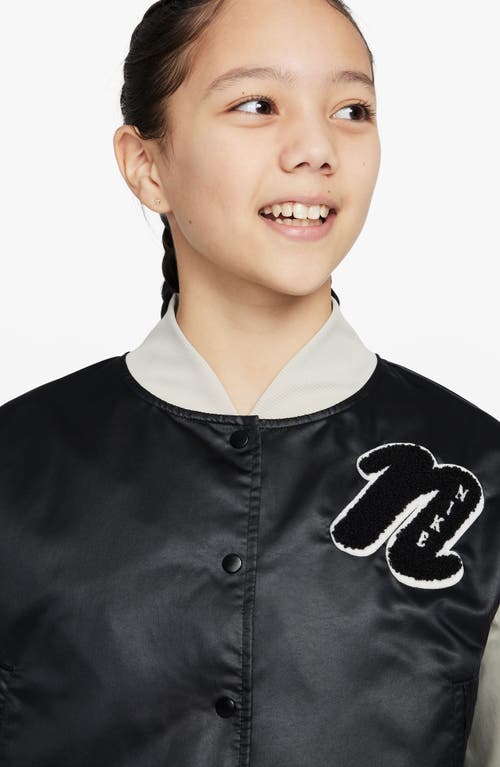 Shop Nike Kids' Sportswear Satin Varsity Jacket In Black/light Bone