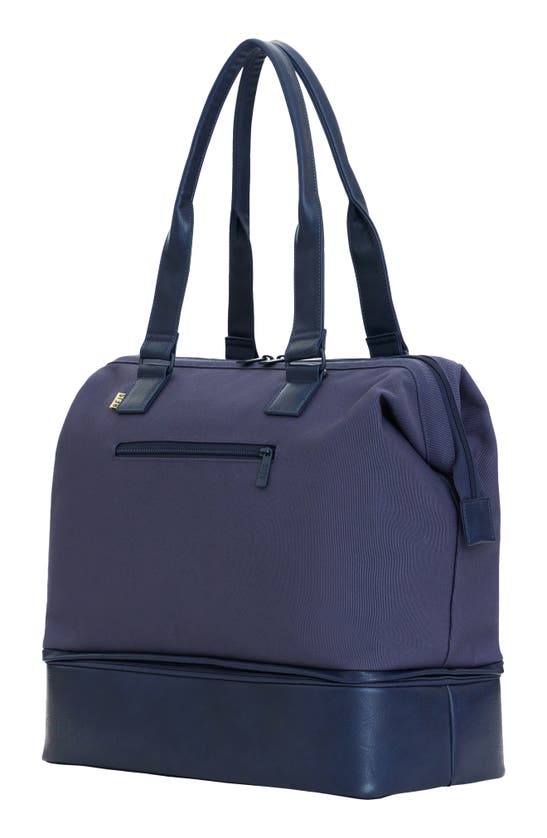 Shop Beis The Convertible Mini Weekend Travel Bag In Navy