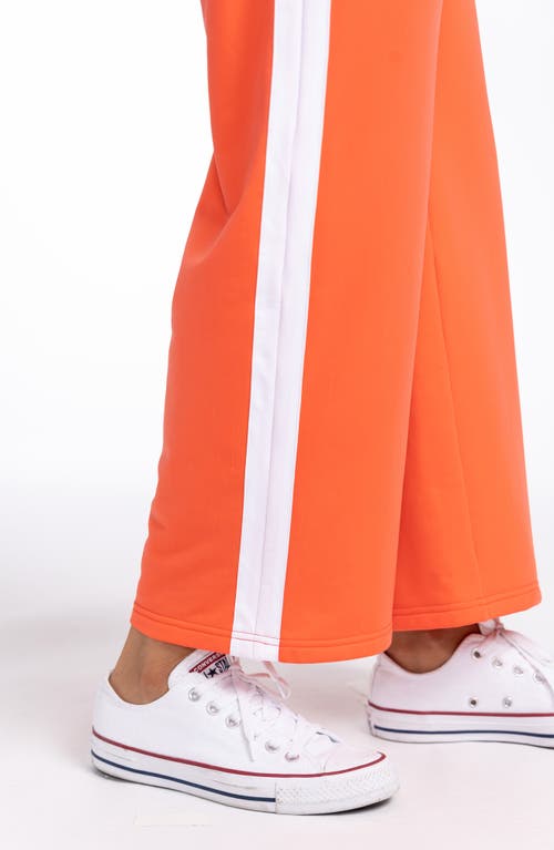 Shop Kinona Cozy Wide Leg Golf Pants In Coral Red