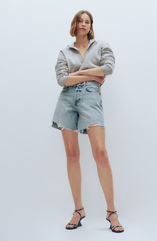Shop Reformation Raye Relaxed Mid Thigh Denim Cutoff Shorts In Tenaya