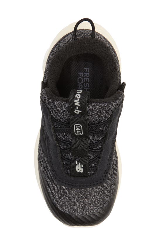 Shop New Balance Kids' 1440 Sneaker In Black/ Angora