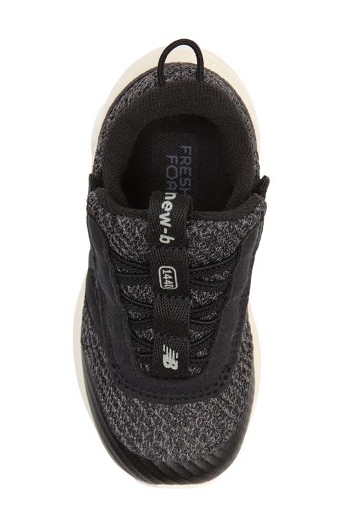 Shop New Balance Kids' 1440 Sneaker In Black/angora
