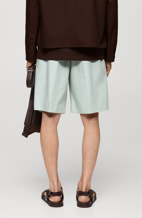 Shop Mango Relaxed Fit Pleated Bermuda Shorts In Pastel Green