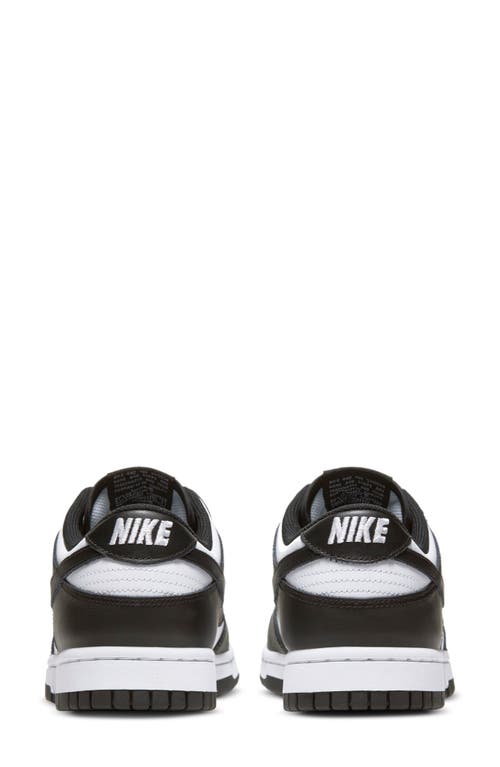 Shop Nike Dunk Low Basketball Sneaker In White/black/white