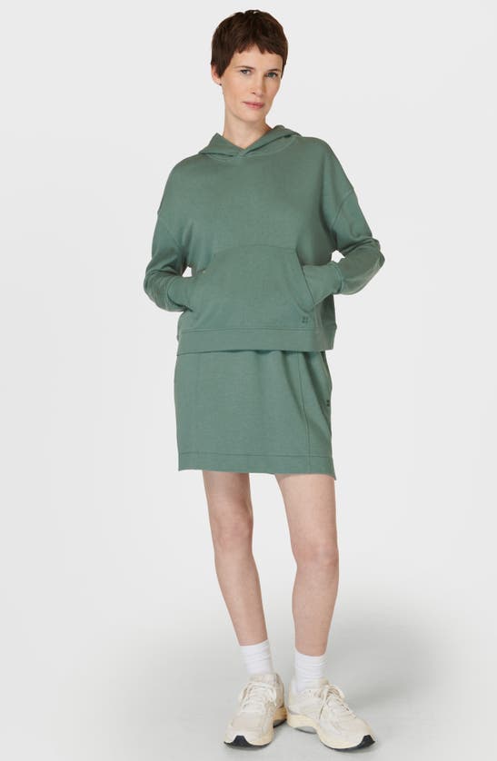 Shop Sweaty Betty After Class Organic Cotton Blend Hoodie In Cool Forest Green