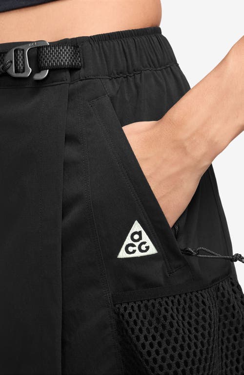 Shop Nike Acg Snowgrass Uv Utility Cargo Maxi Skirt In Black/summit White