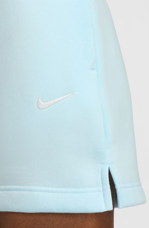 Shop Nike Phoenix High Waist Fleece Miniskirt In Glacier Blue/sail