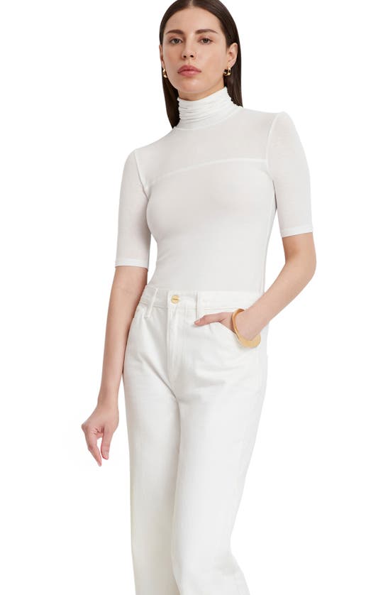 Shop Marcella Niko Jersey Turtleneck Top In Off White