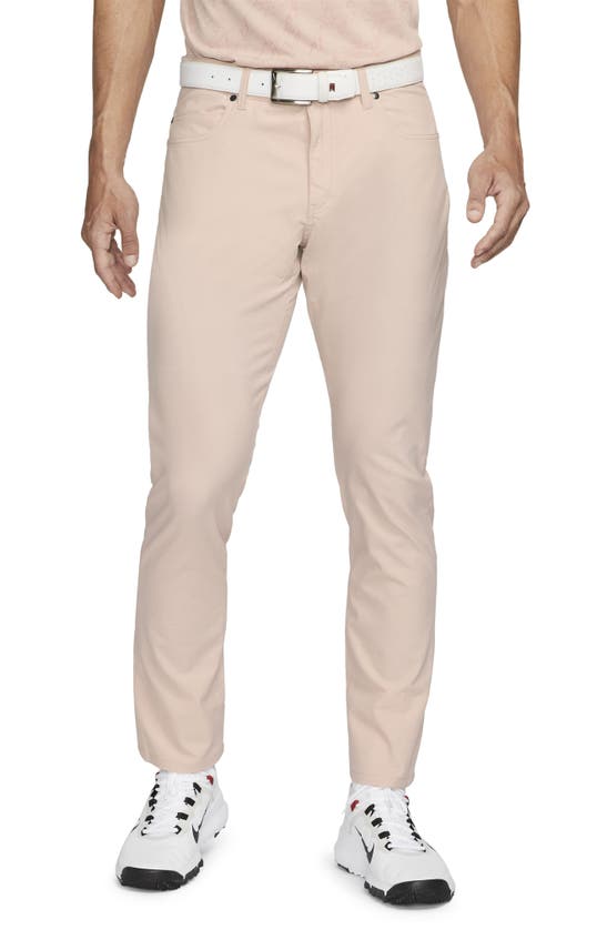 Nike Dri-fit Repel Water Repellent Slim Fit Golf Pants In Pink Oxford