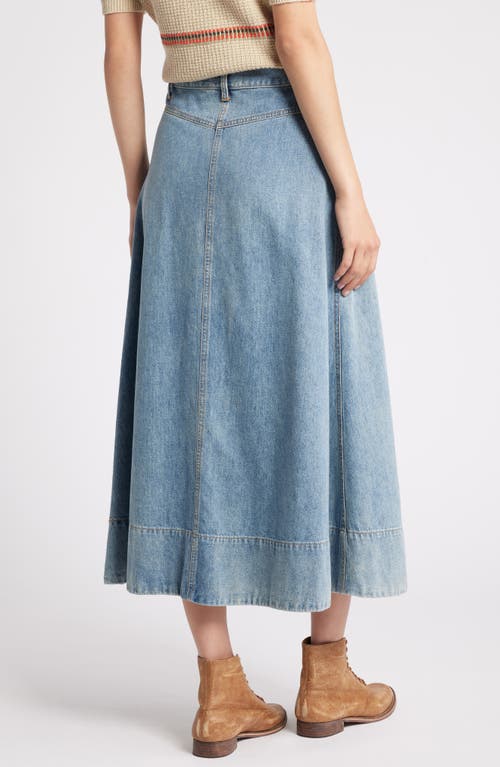 Shop The Great . The Field Denim Maxi Skirt In Misty Wash