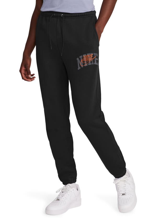 Shop Nike Club Fleece Sweatpants In Black/ Safety Orange