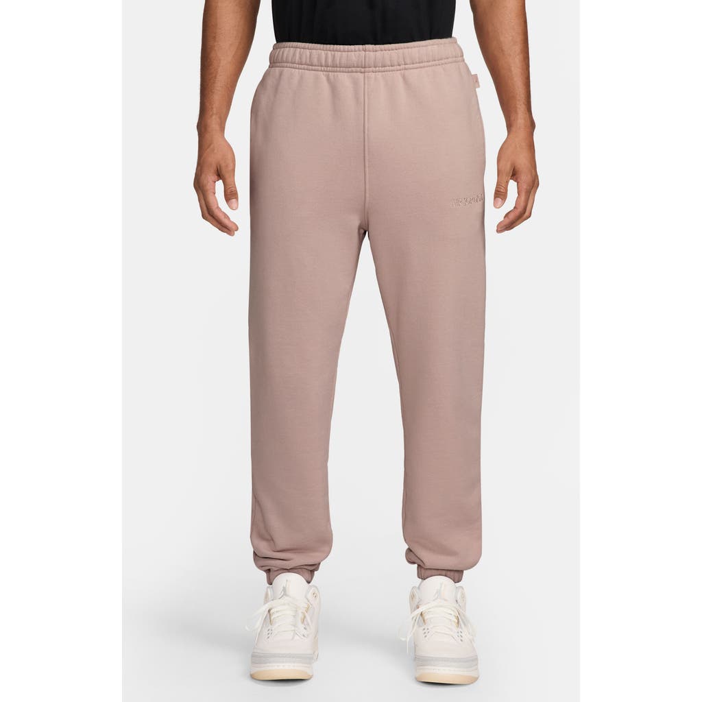 Jordan Wordmark Cotton Fleece Sweatpants In Pink Oxford