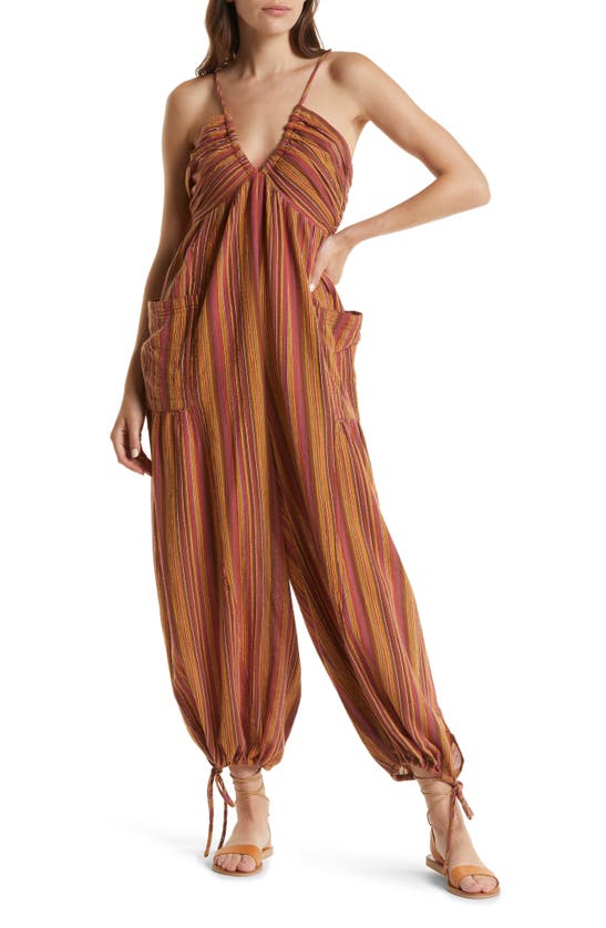 Click to view more detailed imagery on our partner's website Free People Sundaze For Surfin Halter Jumpsuit In Red