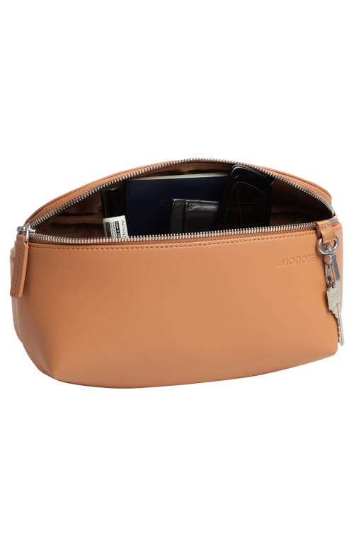 Shop Monos Metro Sling Bag In Saddle Tan