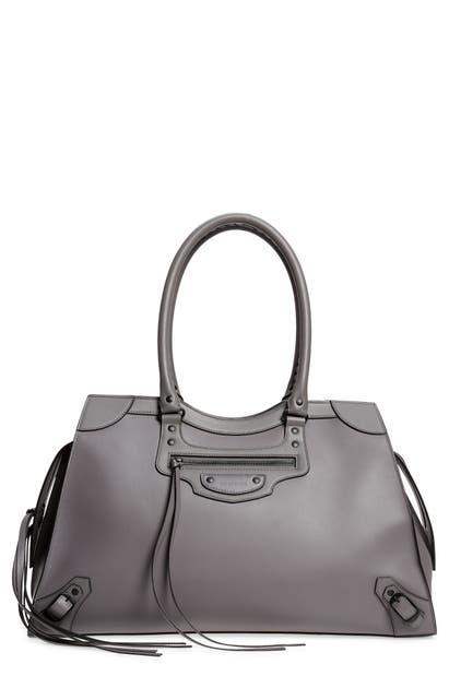 Click to view more detailed imagery on our partner's website Balenciaga Neo Classic City Leather Weekend Tote In 1404 Dark Grey