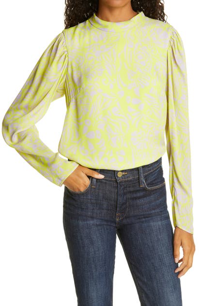 Click to view more detailed imagery on our partner's website Tanya Taylor Elena Tie Back Long Sleeve Top In Cutwork Floral Acid Lime