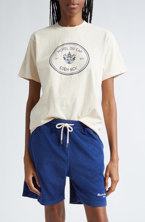 Shop Sporty And Rich Sporty & Rich Eden Roc Crest Cotton Graphic T-shirt In Cream