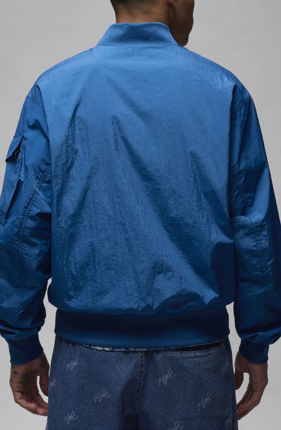 Shop Jordan Essentials Lightweight Nylon Renegade Jacket In Industrial Blue