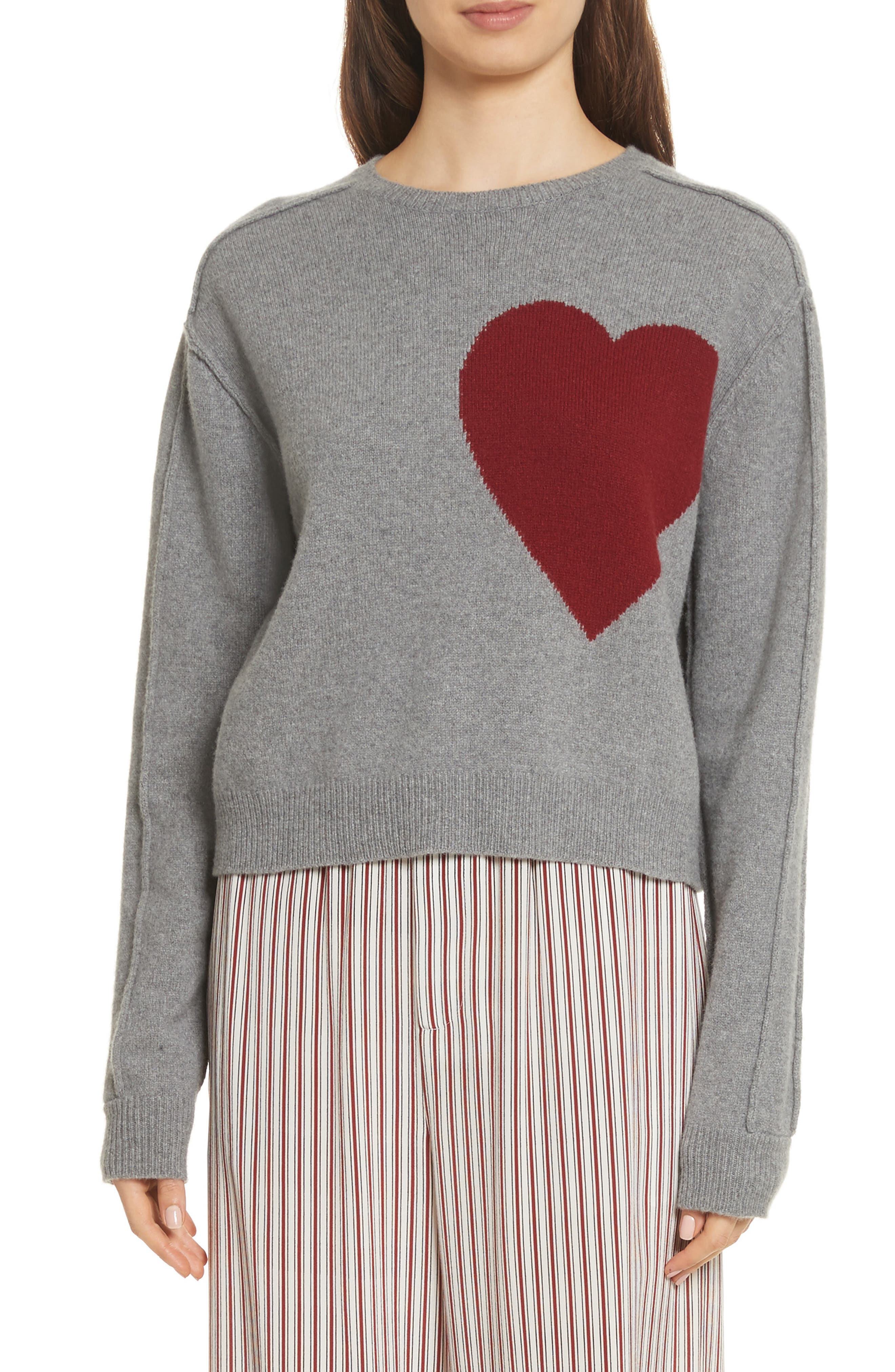 grey sweater with red heart