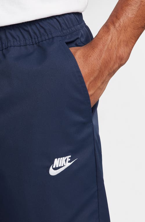 Shop Nike Woven Tapered Leg Pants In Midnight Navy/white