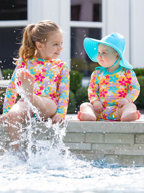 Shop Rufflebutts Toddler Girls Long Sleeve Upf50+ One Piece Rash Guard In Endless Summer Floral