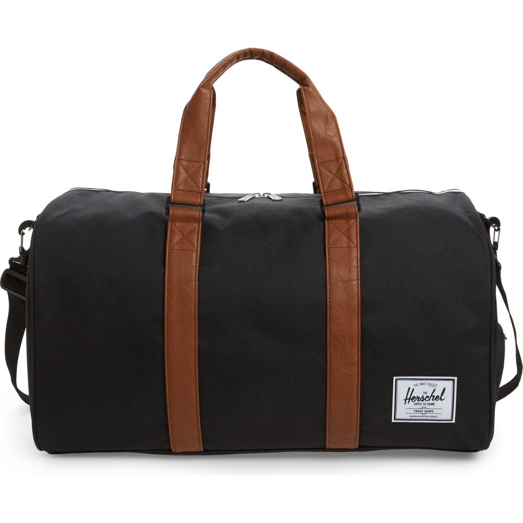 Shop Herschel Supply Co . Duffle Bag In Black/tan