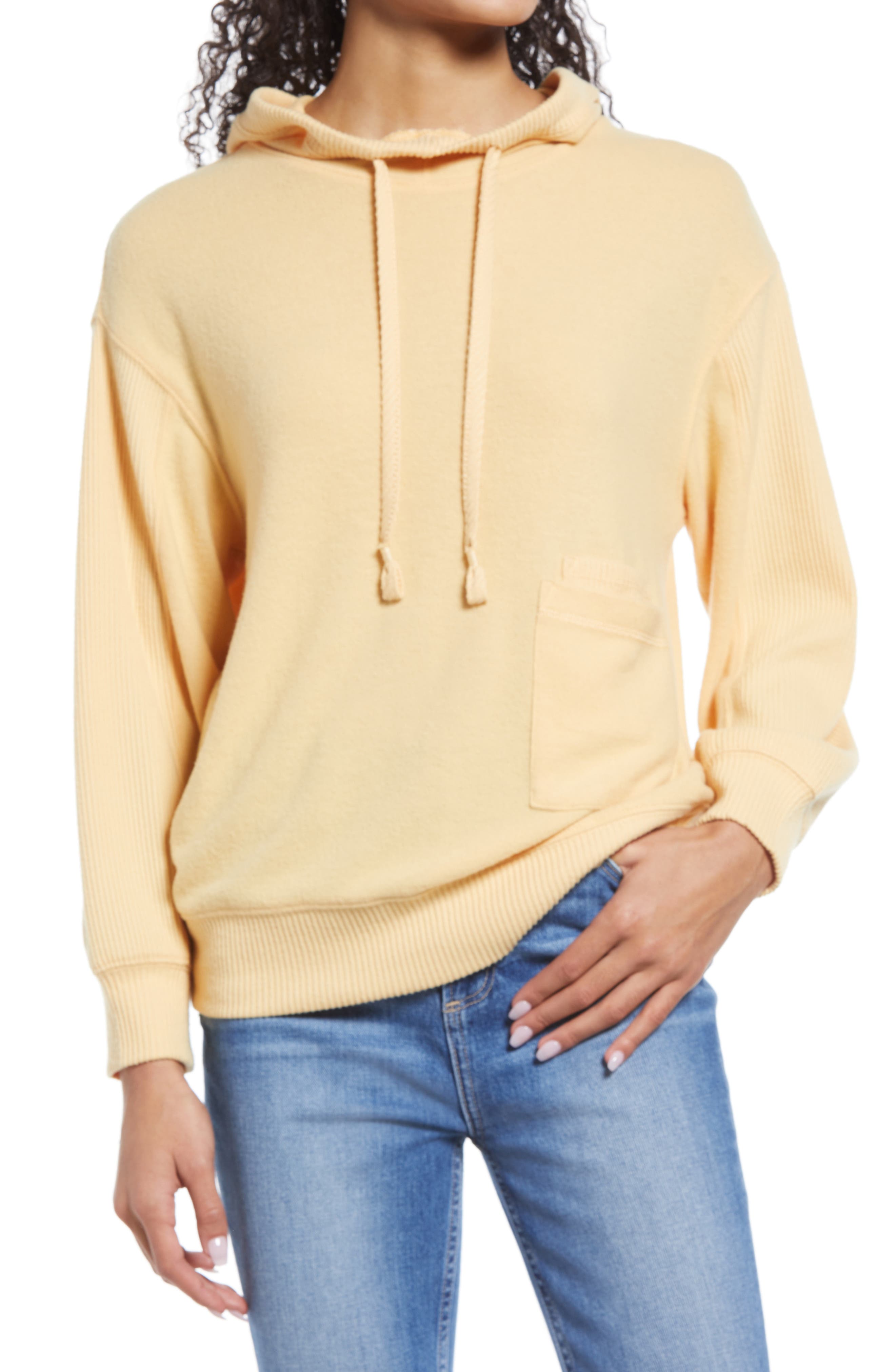 women's yellow sweatshirt