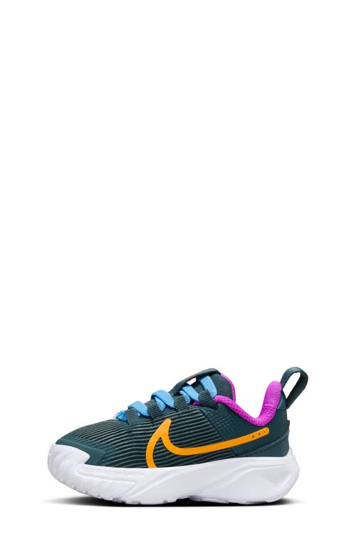 Shop Nike Kids' Star Runner 4 Sneaker In Deep Jungle/sundial/violet