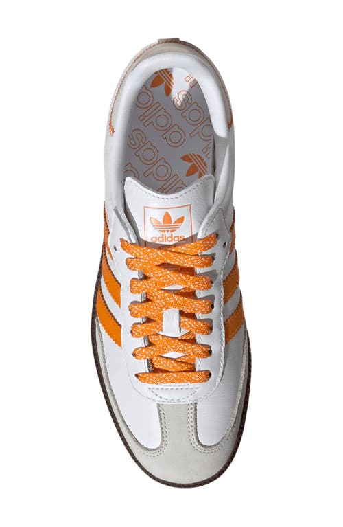 Shop Adidas Originals Adidas Samba Sneaker In White/orange/off White