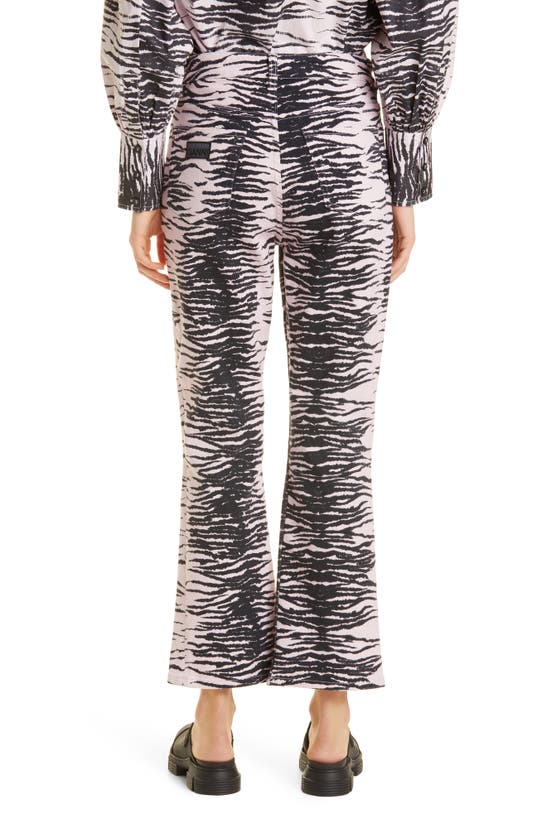 Shop Ganni Betzy Tiger Stripe Kick Flare Stretch Organic Cotton Jeans In Tiger Stripe Light Lilac