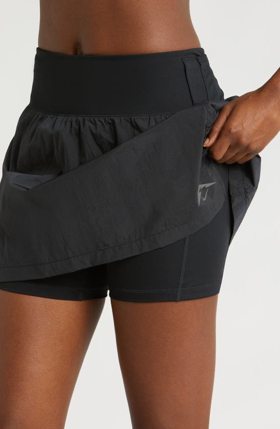 Shop Nike Trail Repel Running Skort In Black/ Black/ Dk Smoke Grey