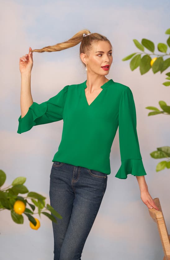 Shop Cece Ruffle Cuff Crepe Top In Green