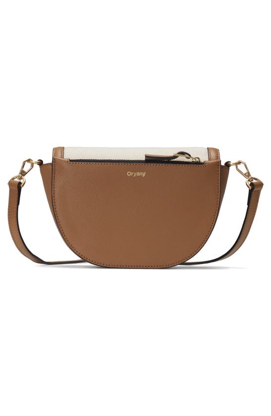 Oryany Lottie Saddle Canvas Crossbody Bag In Sand Brown