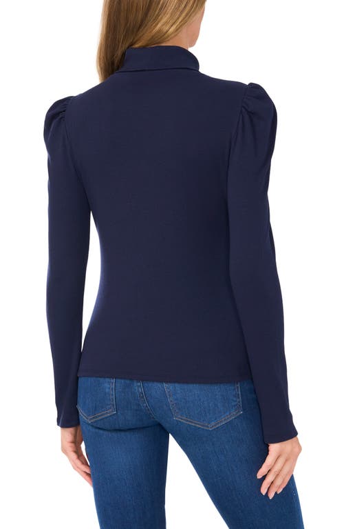 Shop Cece Gathered Sleeve Turtleneck Top In Classic Navy Blue