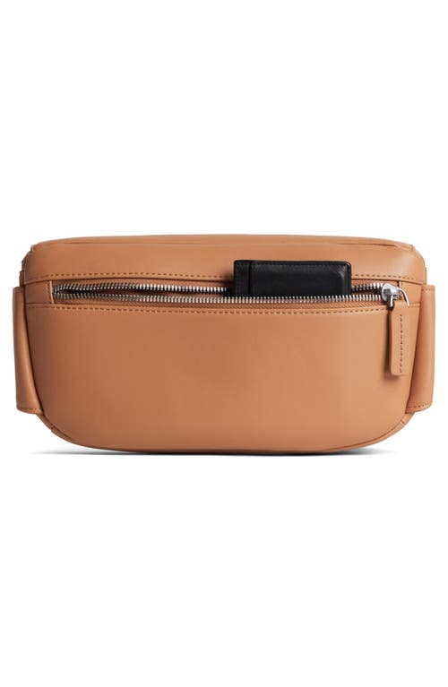 Monos Metro Sling Bag In Saddle Tan